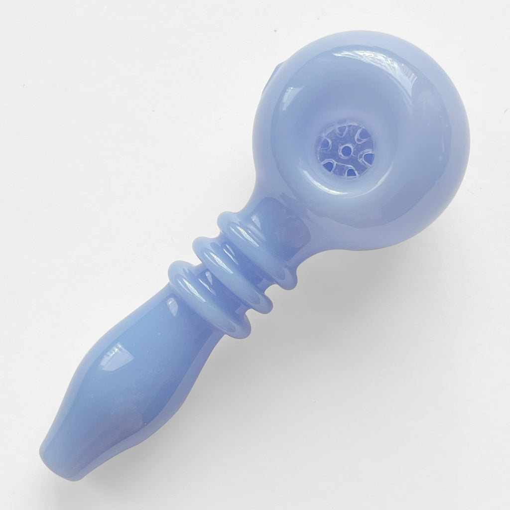 periwinkle blue glass hand pipe with glass filter in the bowl 